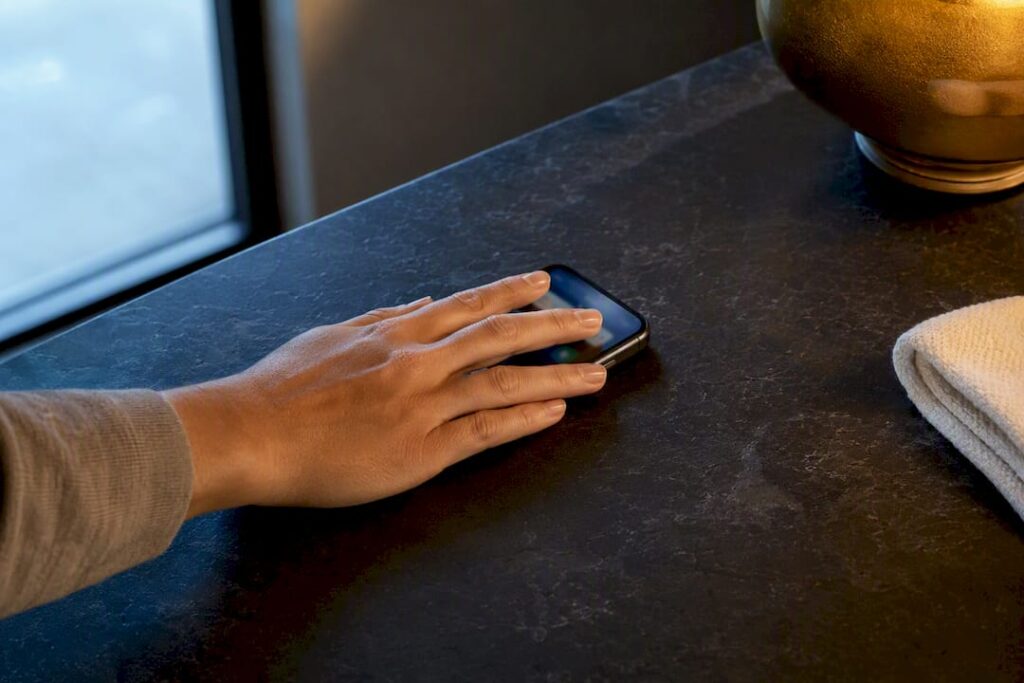 Hand setting phone aside after boundary decision